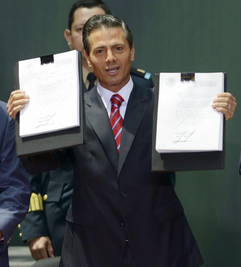 Mexikos Präsident Enrique Peña Nieto nach der Verabschiedung und Unterzeichnung der Gesetze über die Energiereform am 11. August