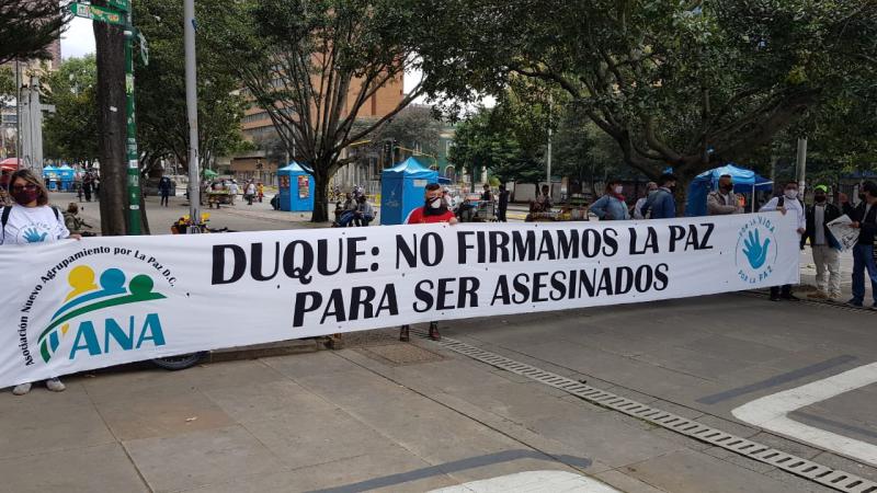 Transparent beim Marsch der Farc-Partei: "Duque: Wir haben den Frieden nicht geschlossen, um ermordet zu werden"
