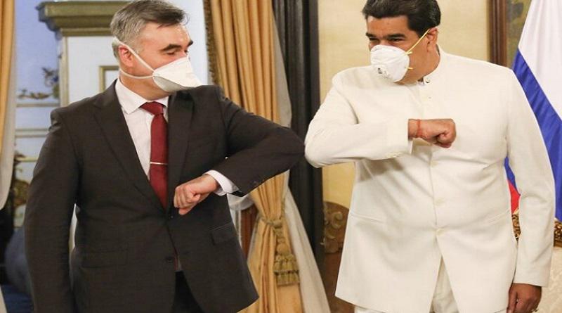 Der russische Botschafter Melik-Bagdasarov und Präsident Maduro
