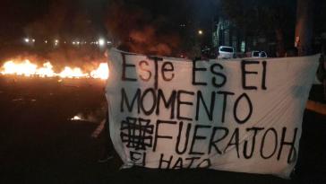 Transparent bei den Protesten zum 10. Jahrestag des Putsches in Honduras: "Das ist der Moment. Weg mit JOH"